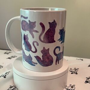 15 oz. Ceramic mug w/cute blue, purple, & pink custom paint splatter cat design.